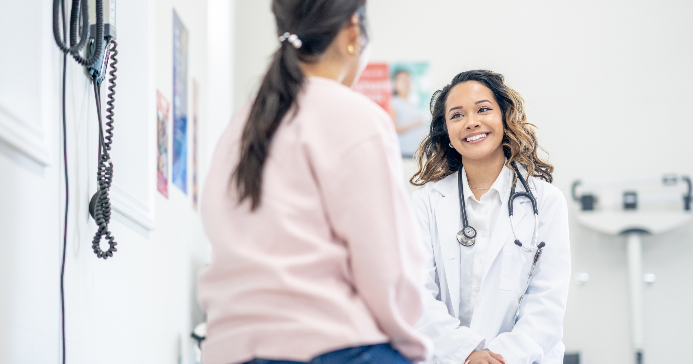Patient talking to a doctor about a referral.